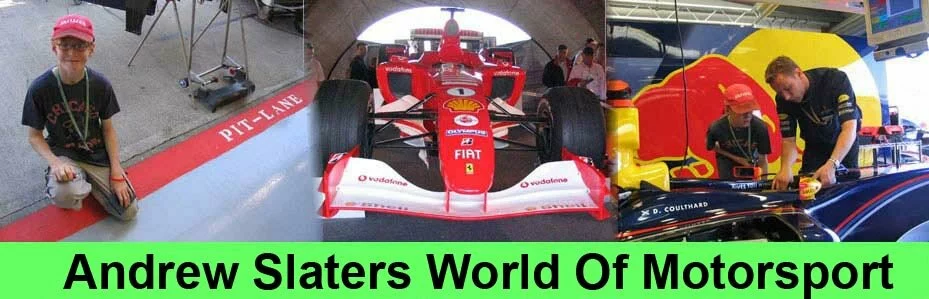 Andrew Slater in the pitlane at the British Grand Prix 2005 with Michael Schumachers Formula 1 Car and looking into David Coulthards Formula 1 Red Bull at the British Grand Prix 2005